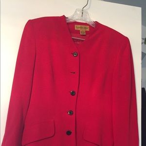 Red 2 piece designer suit. 100% silk, fully lined